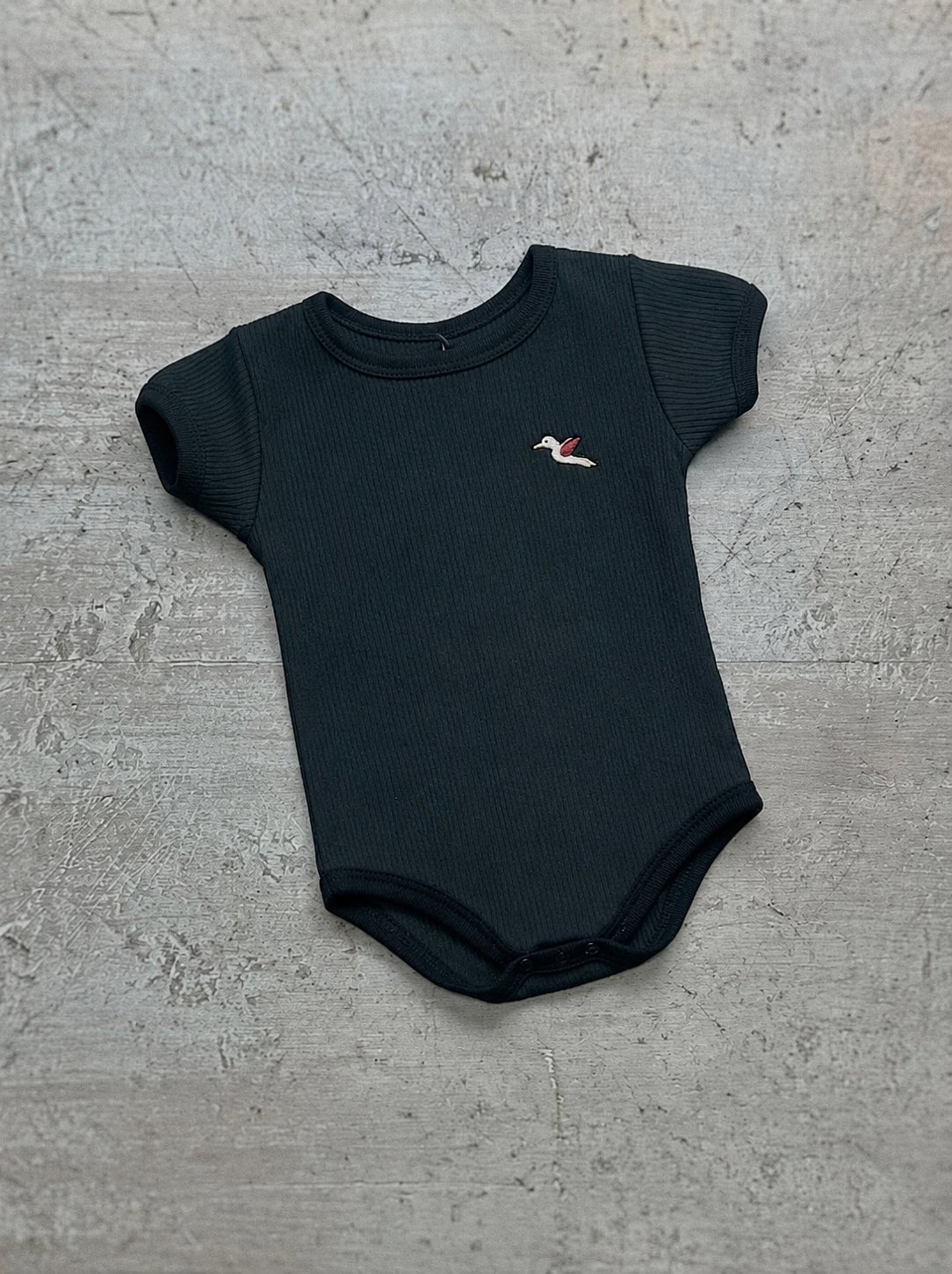 Body Risueño Negro Unicolor Bebe